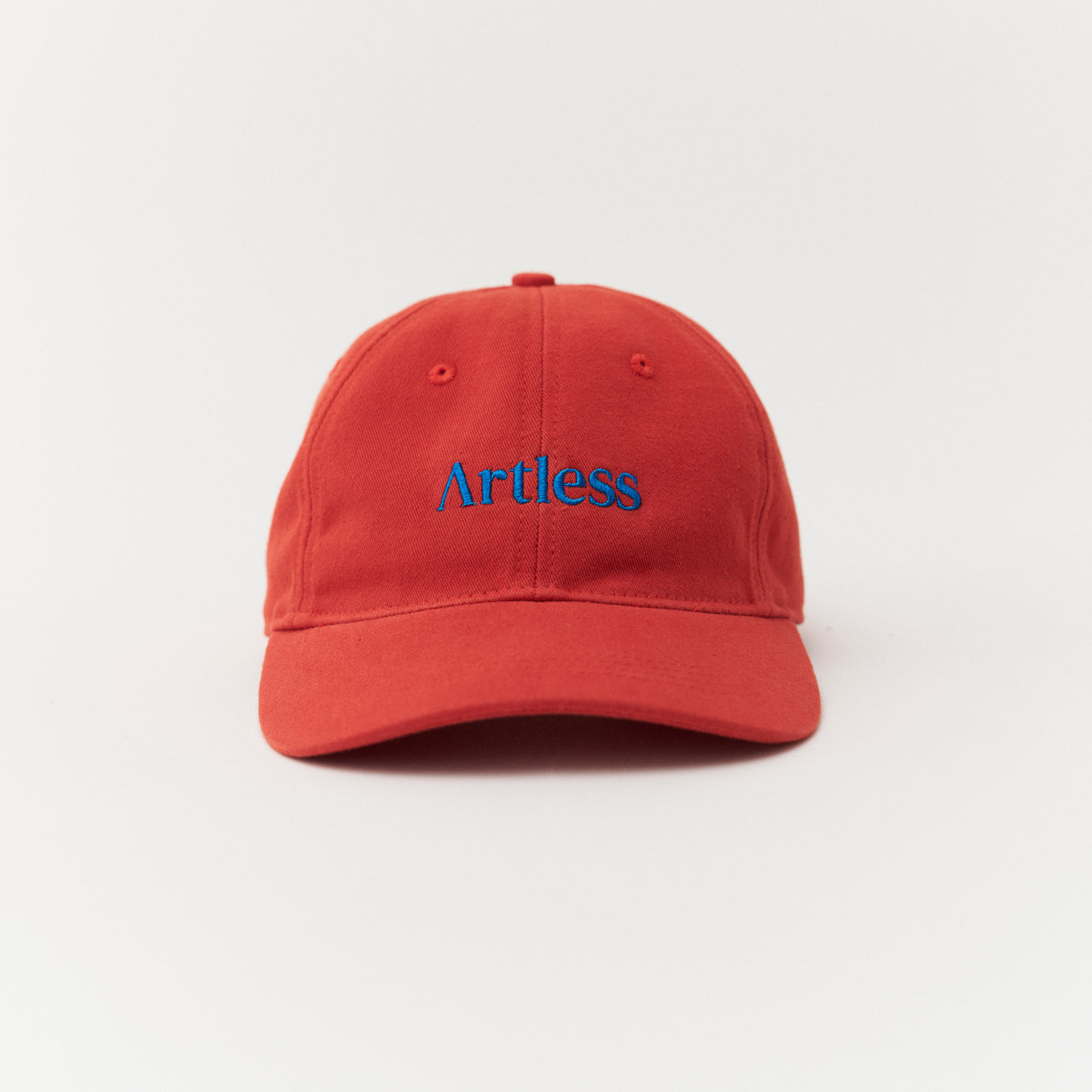 Artless red cap with blue text