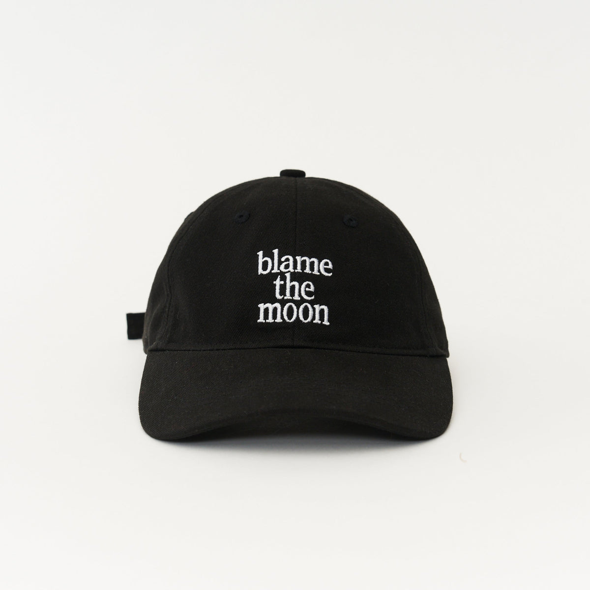 Black Artless blame the moon organic dad cap, front view, unstructured 6-panel GOTS organic cotton