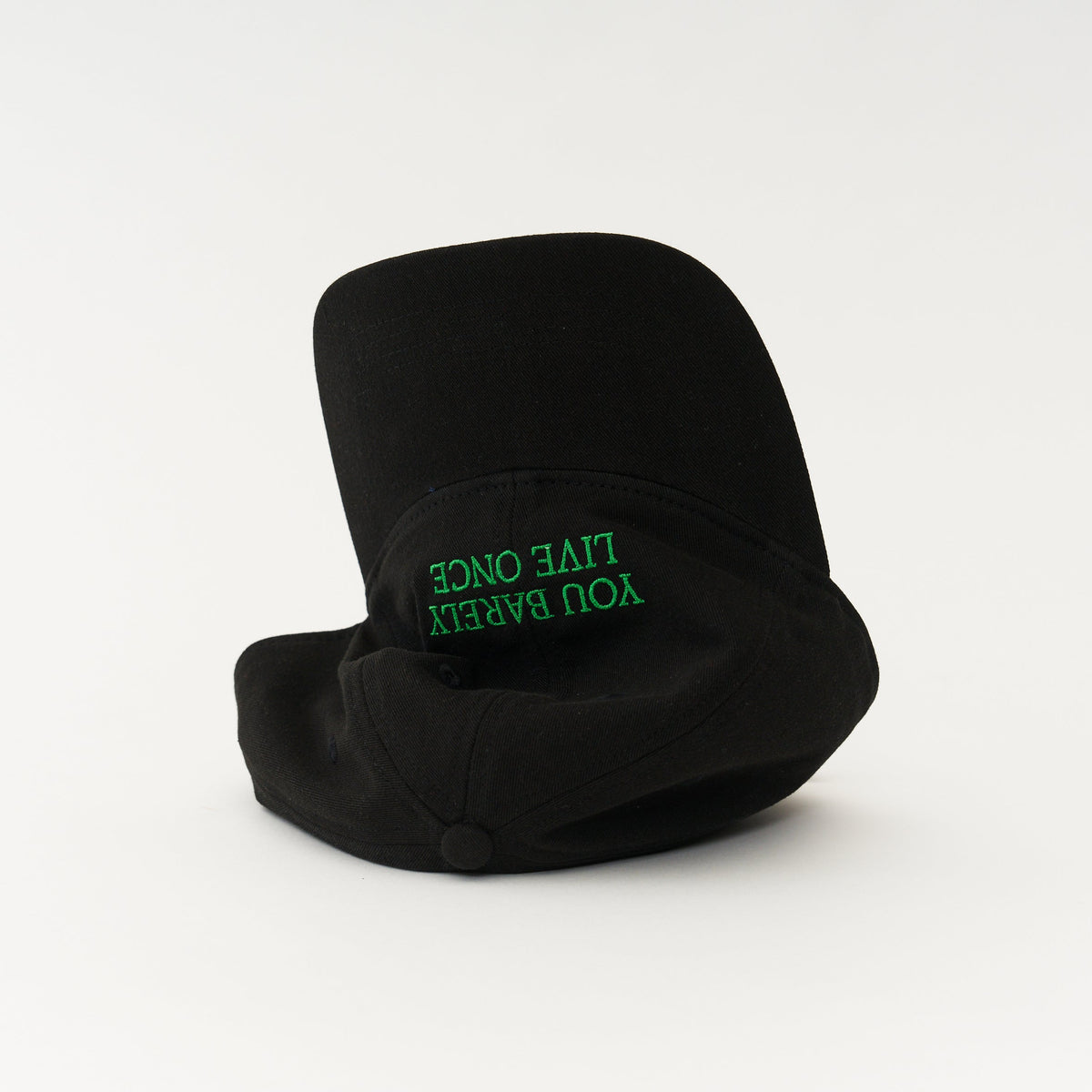 Black Artless You Barely Live Once organic dad cap with green embroidery, front view, unstructured 6-panel GOTS organic cotton