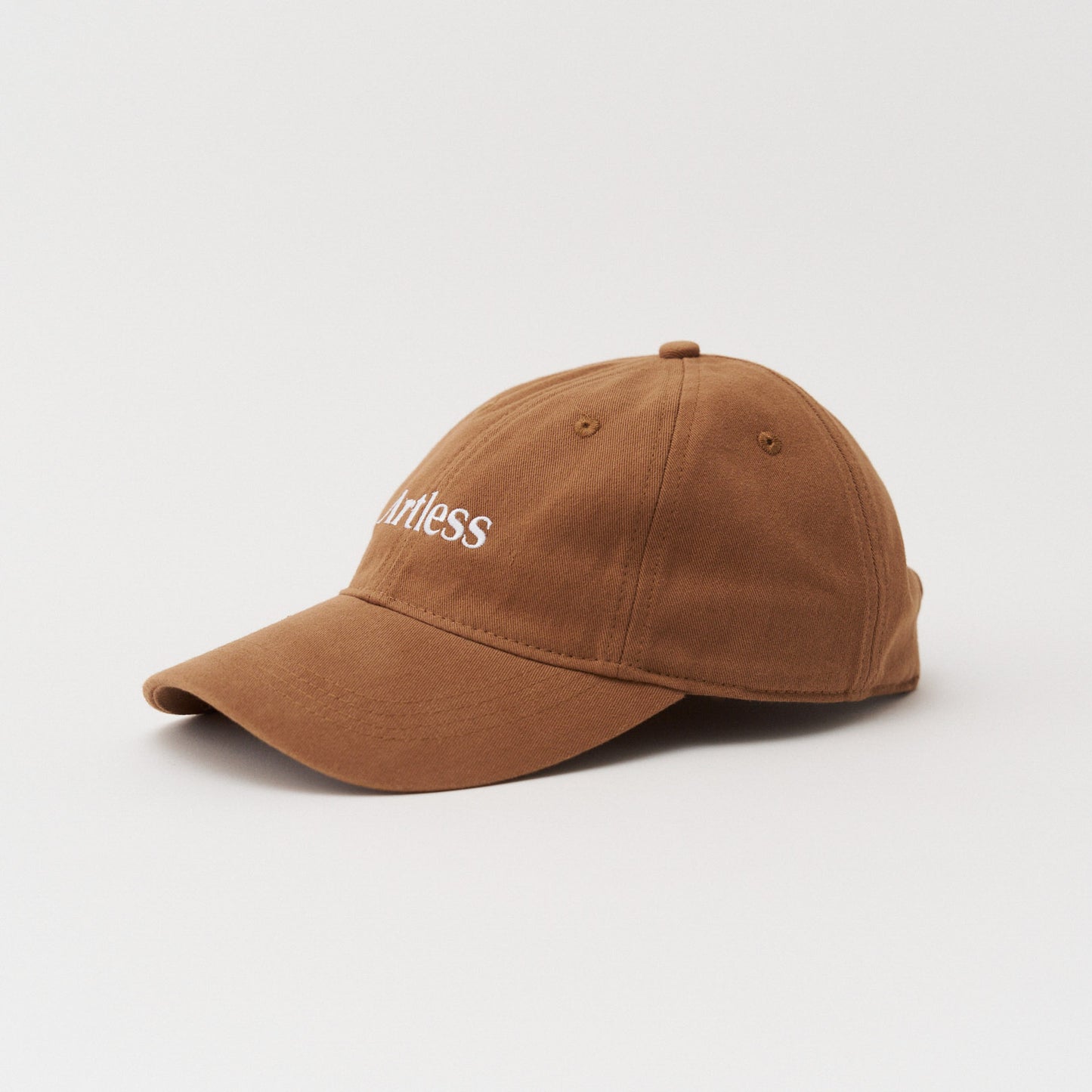 Brown unstructured 6-panel dad cap made from GOTS certified organic cotton by Artless side view