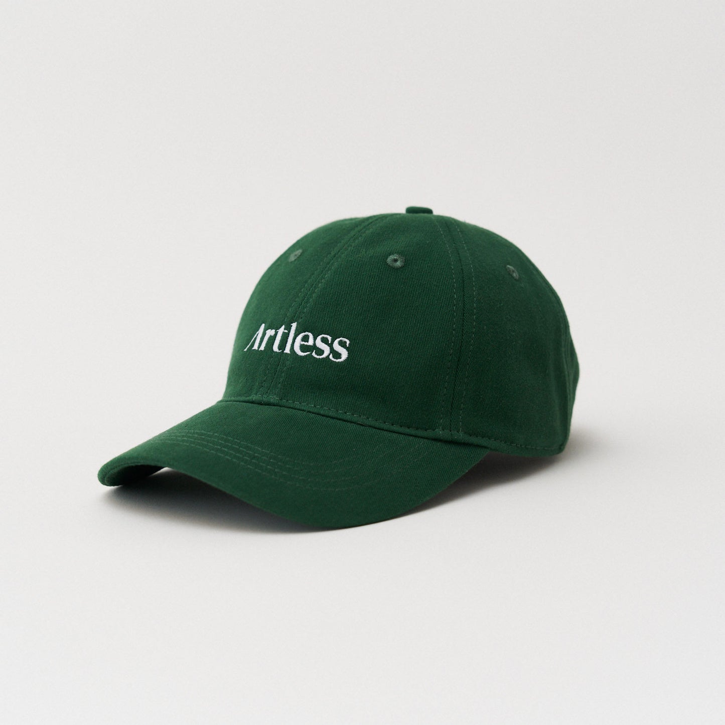 green unstructured 6-panel dad cap made from GOTS certified organic cotton by Artless