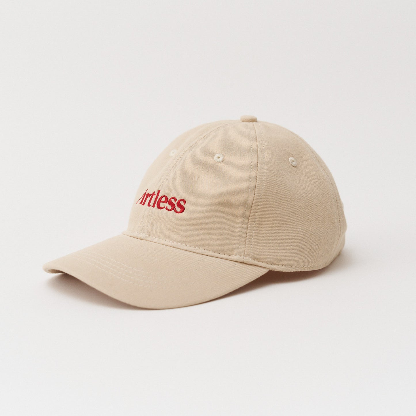 Sand coloured unstructured 6-panel dad cap made from GOTS certified organic cotton by Artless side view