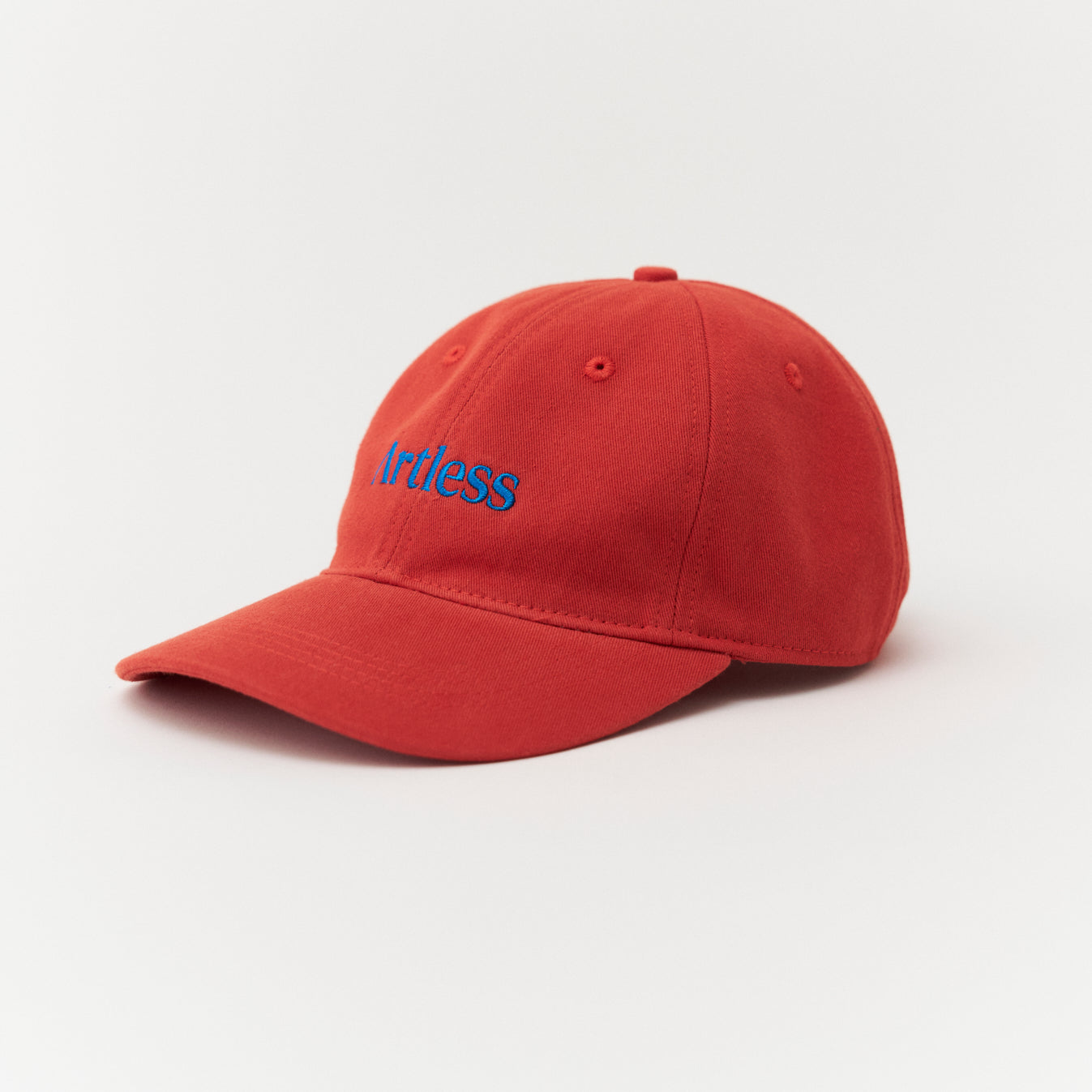 Artless red cap with blue text side profile