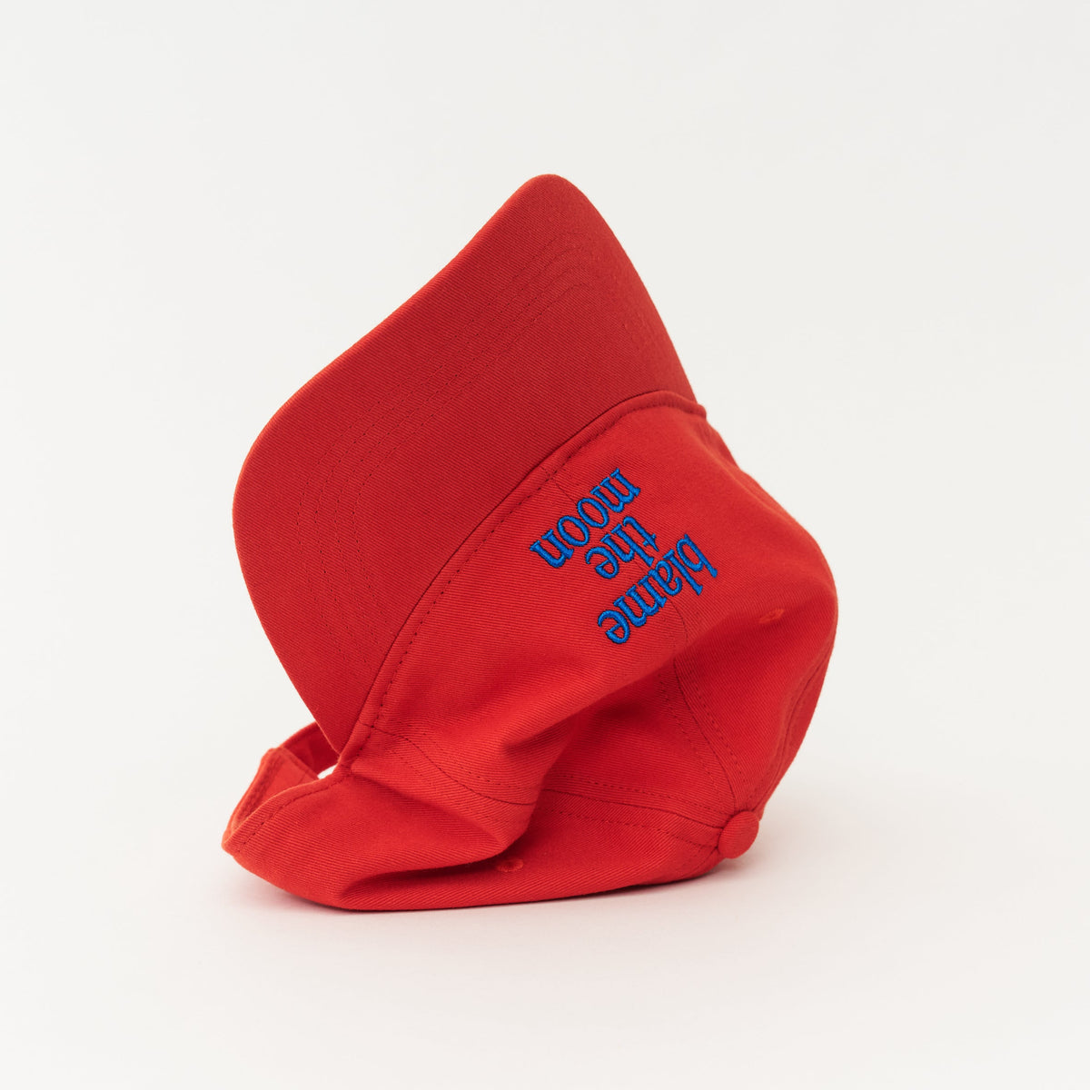 Red Artless blame the moon organic dad cap with blue embroidery, unstructured 6-panel GOTS organic cotton