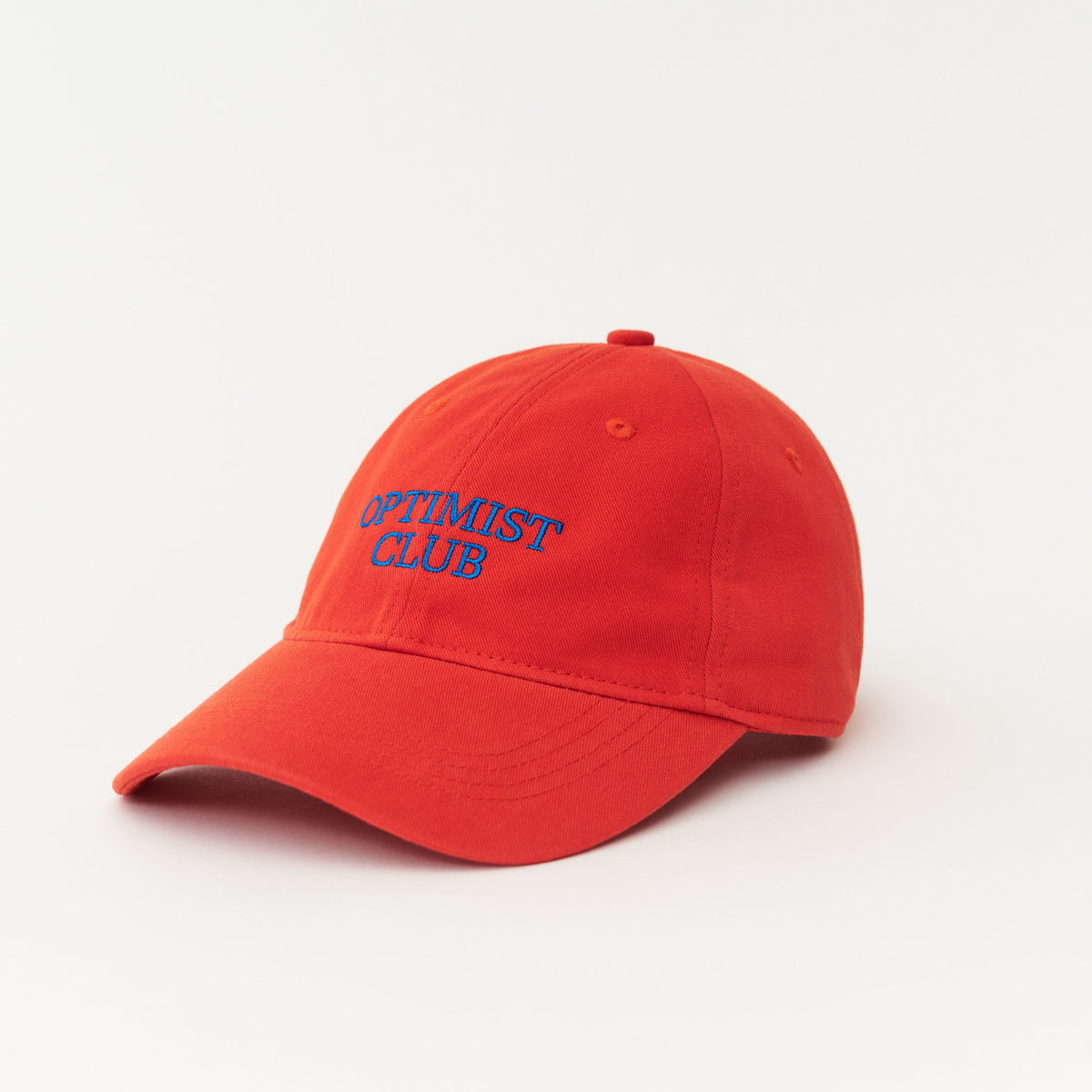 Red Artless Optimist Club organic dad cap with blue embroidery, unstructured 6-panel GOTS organic cotton