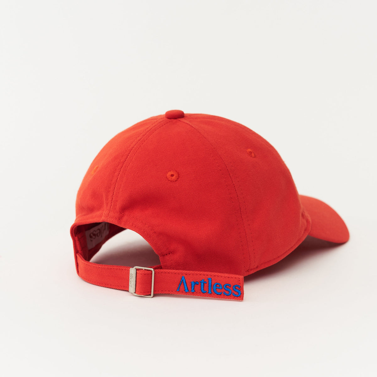 Red Artless Optimist Club organic dad cap with blue embroidery, unstructured 6-panel GOTS organic cotton
