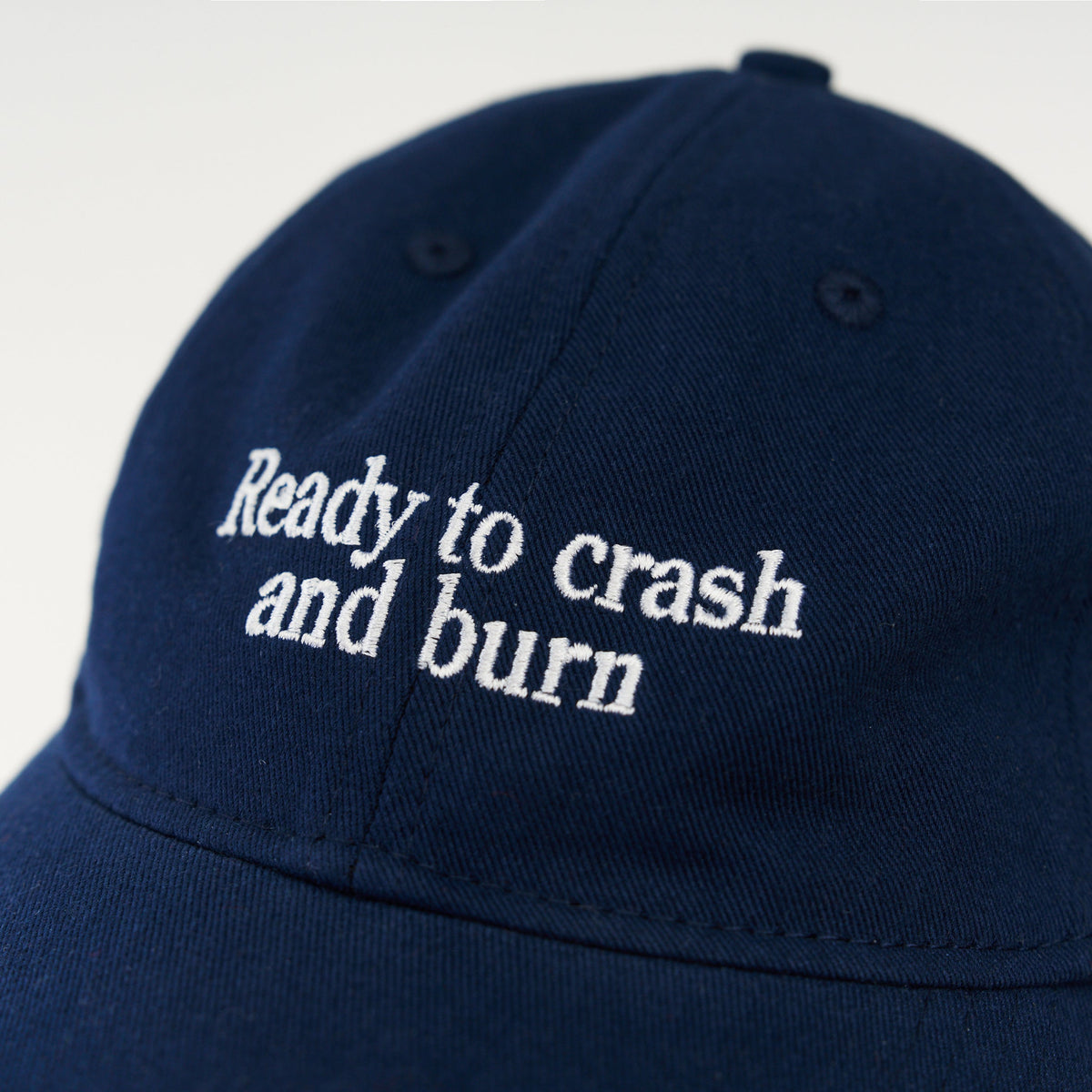 Navy Artless Ready to crash and burn organic dad cap, front view, unstructured 6-panel GOTS organic cotton