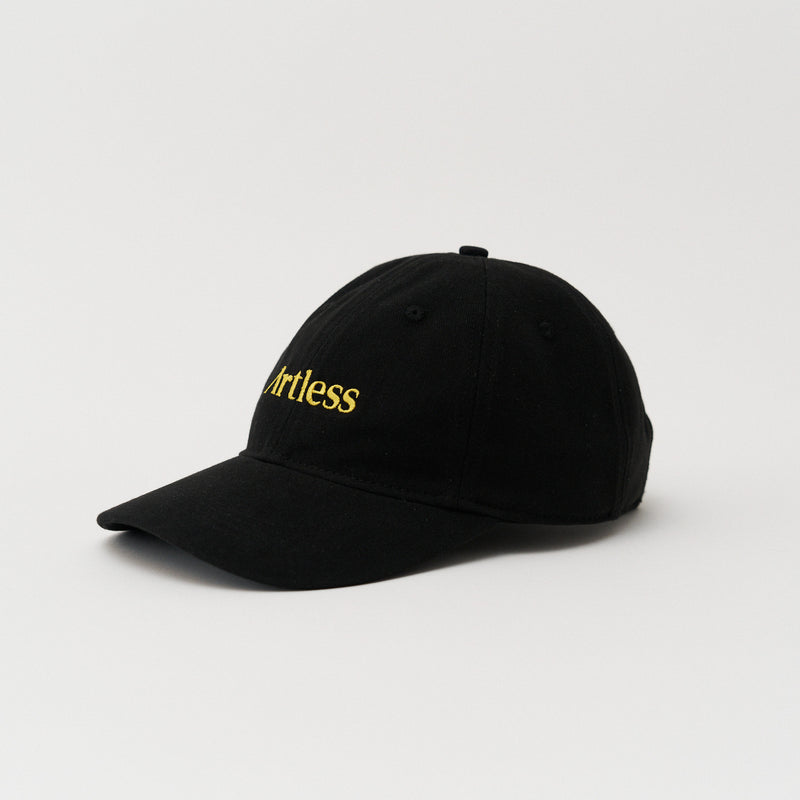 Black unstructured 6-panel dad cap made from GOTS certified organic cotton by Artless, side view