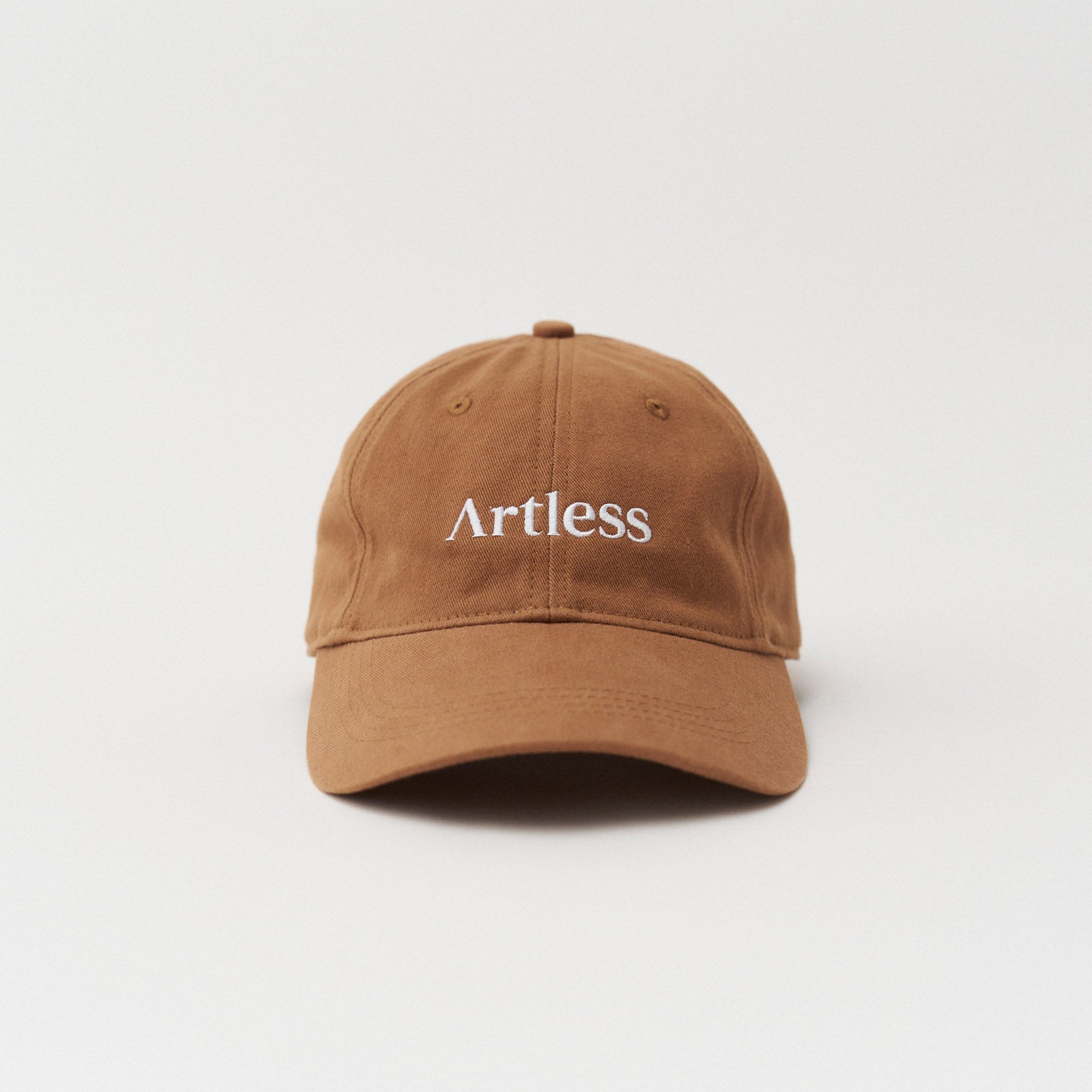 Brown unstructured 6-panel dad cap made from GOTS certified organic cotton by Artless fron view