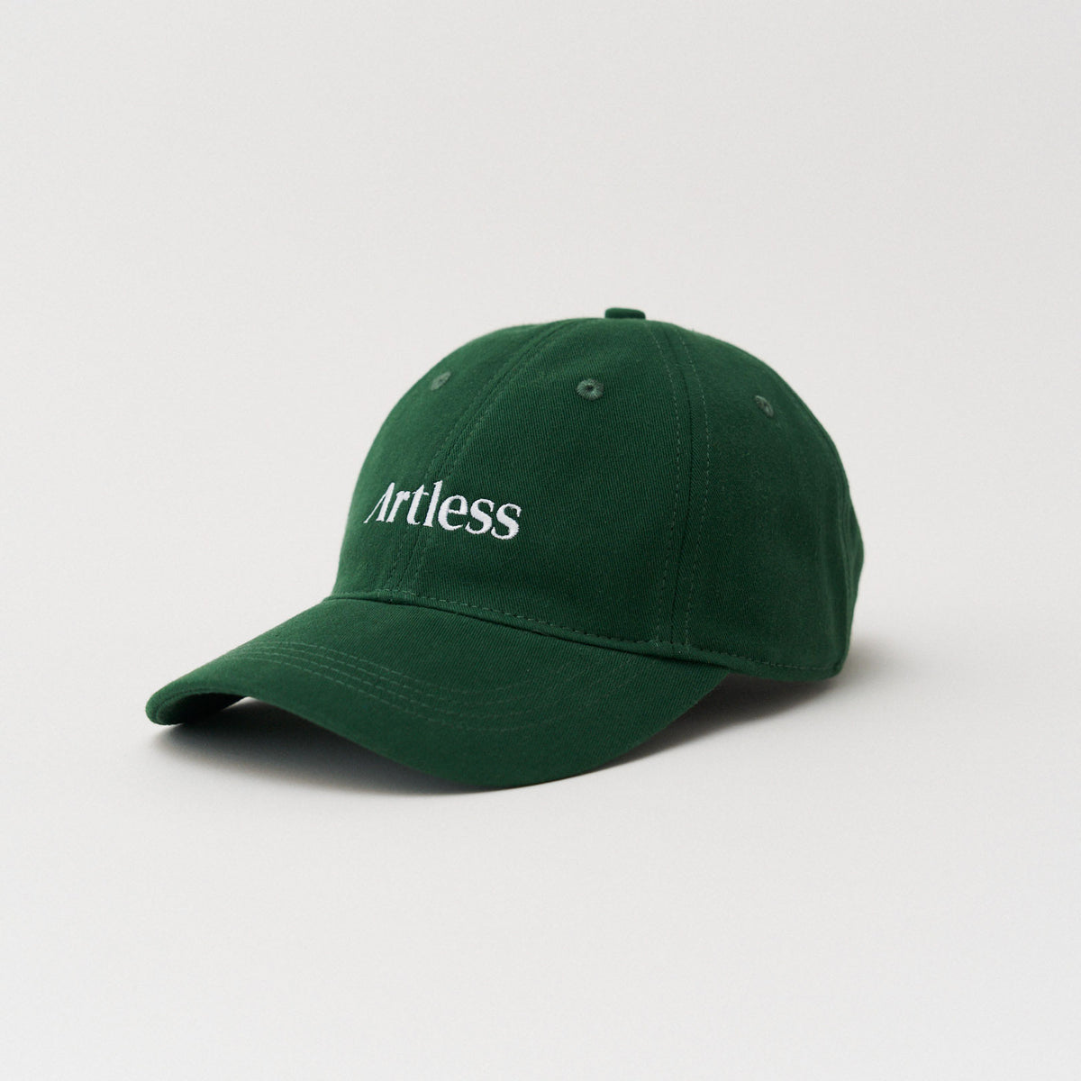 green unstructured 6-panel dad cap made from GOTS certified organic cotton by Artless