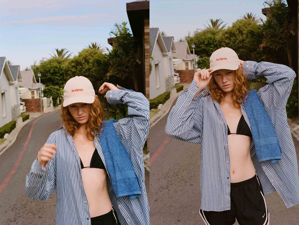 woman wearing a sand coloured unstructured 6-panel dad cap made from GOTS certified organic cotton by Artless