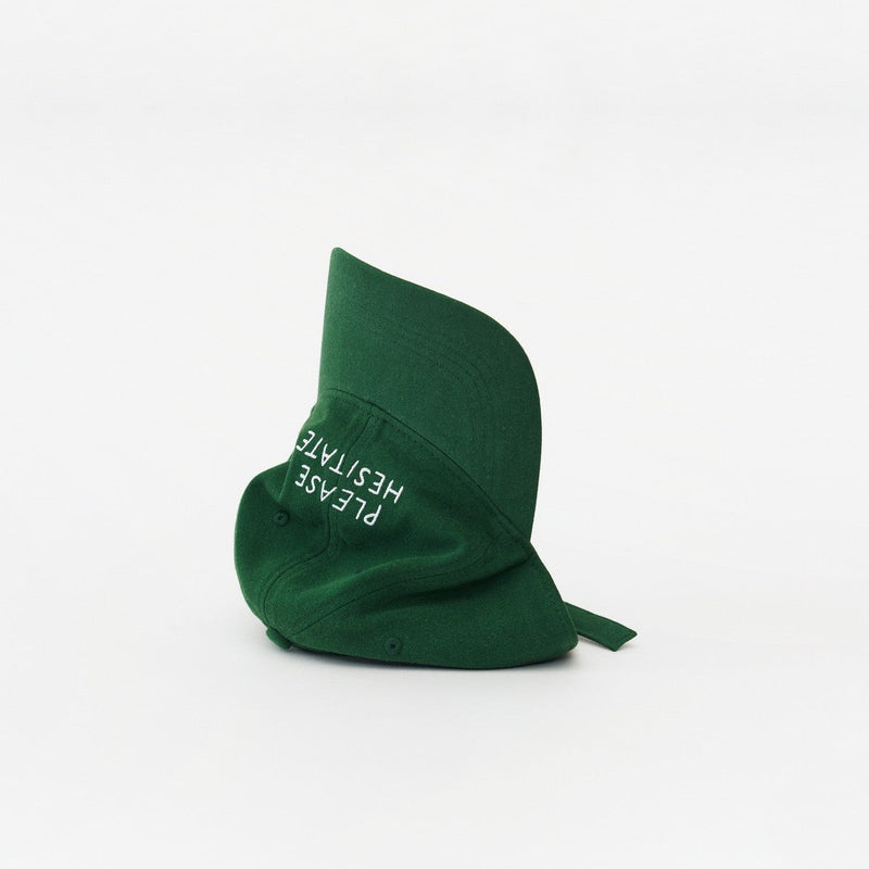 Green Artless Please Hesitate organic dad cap, laying on its side