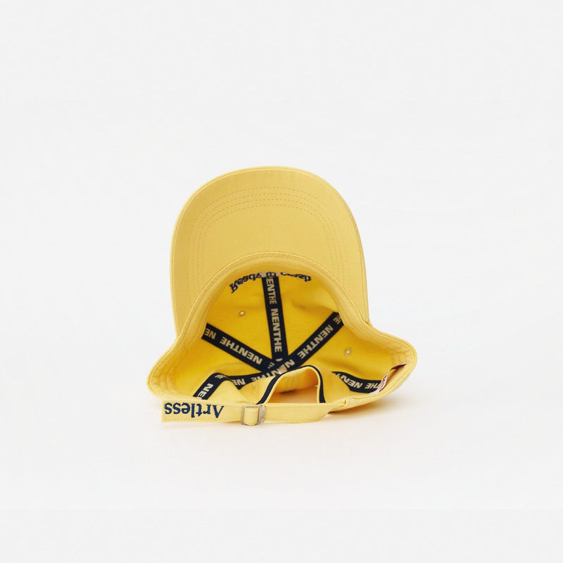 Butter Yellow Artless Ready To Crash And Burn organic dad cap, laying on its side