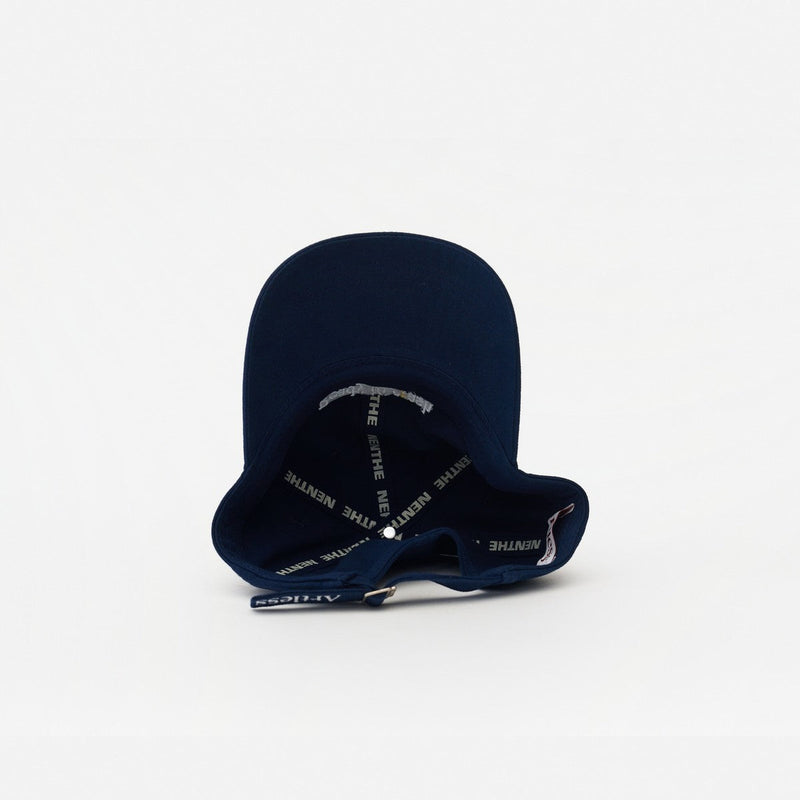 Navy Artless Ready To Crash And Burn organic dad cap, laying on its side